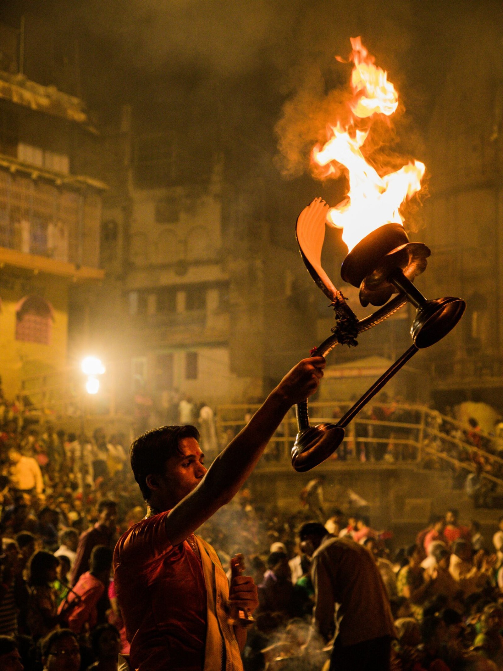 An aarti ritual performed on the Ganges River ghats in Varanasi, India.
